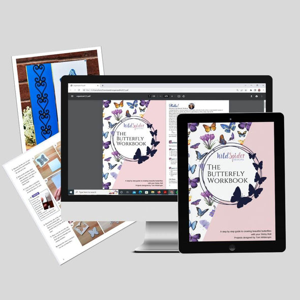 The Butterfly Workbook Digital Edition, shown on a pad and computer screen with some pages from the book