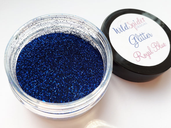 A close up of the Royal Blue glitter in its pot.